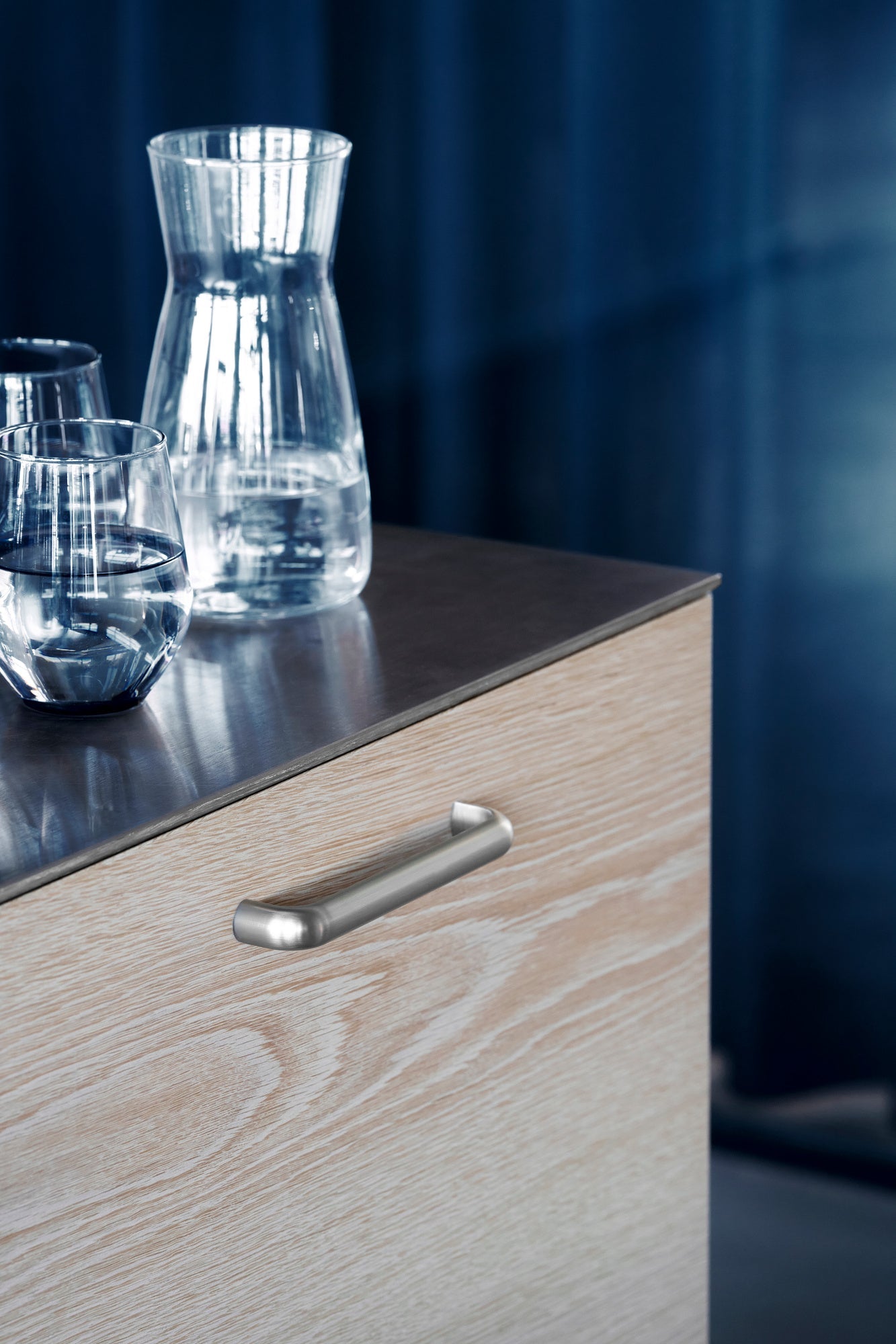 Satin Steel "Vibe" Cup Knob and Drawer Pull.