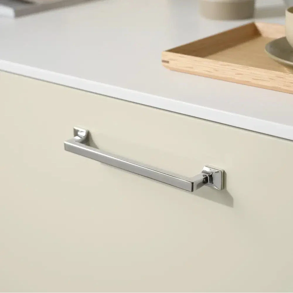 Polished Nickel "Heirloom" Knob and Drawer Pulls.