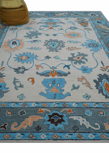 Allure Custom Made Traditional Design Peach And Blue Hand Tufted Wool Rug.