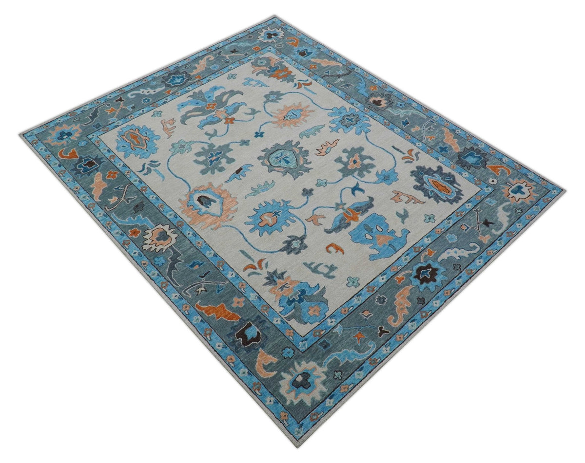 Allure Custom Made Traditional Design Peach And Blue Hand Tufted Wool Rug.