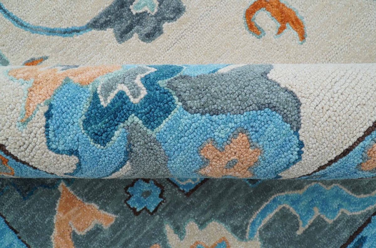Allure Custom Made Traditional Design Peach And Blue Hand Tufted Wool Rug.