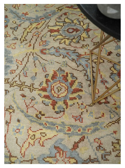 Custom Made Beige, Rust and Blue Traditional Style Hand Knotted Wool Area Rug.