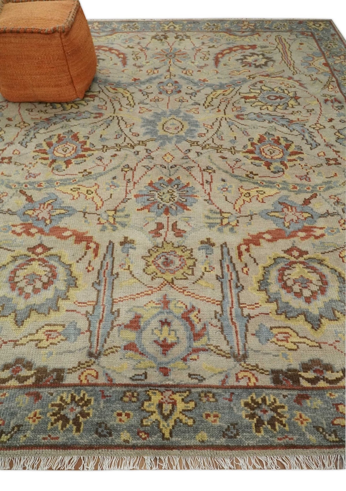 Custom Made Beige, Rust and Blue Traditional Style Hand Knotted Wool Area Rug.