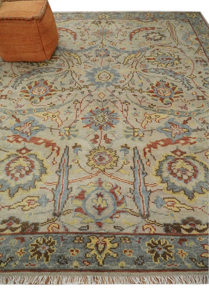 Custom Made Beige, Rust and Blue Traditional Style Hand Knotted Wool Area Rug.