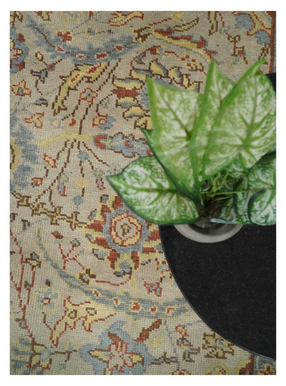 Custom Made Beige, Rust and Blue Traditional Style Hand Knotted Wool Area Rug.
