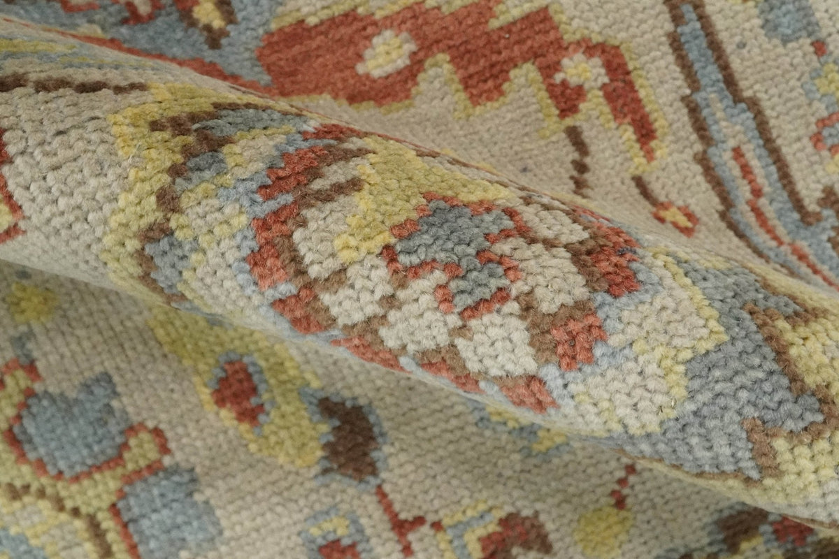 Custom Made Beige, Rust and Blue Traditional Style Hand Knotted Wool Area Rug.