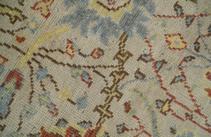 Custom Made Beige, Rust and Blue Traditional Style Hand Knotted Wool Area Rug.