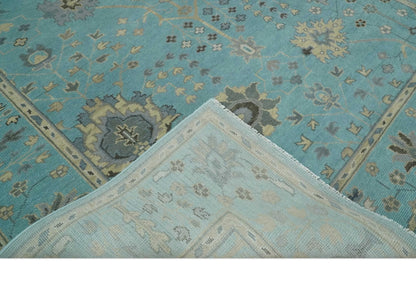 Antique Blue and Beige Hand Knotted Traditional Floral Wool Area Rug.