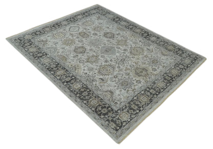 Antique Distressed style Ivory, Charcoal and Beige Low Pile 8x10 wool Area Rug.