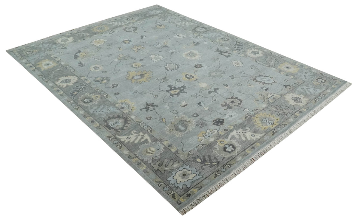 Antique Hand Knotted Silver and Charcoal Traditional Floral Oushak Wool Area Rug.