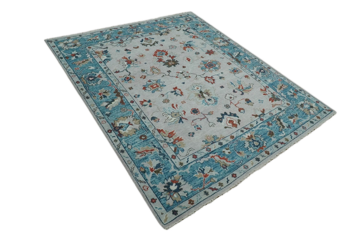 Ivory and Blue Hand knotted Traditional Oushak wool Area Rug.