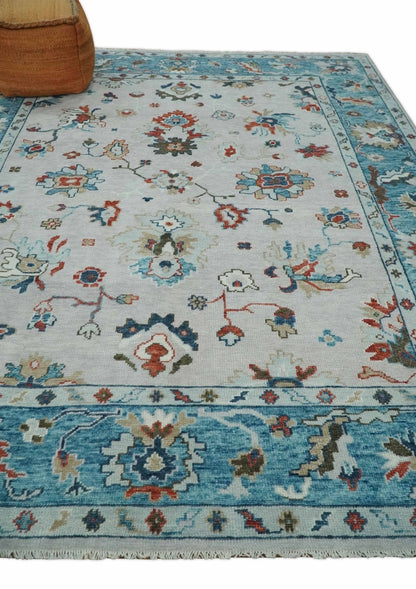 Ivory and Blue Hand knotted Traditional Oushak wool Area Rug.