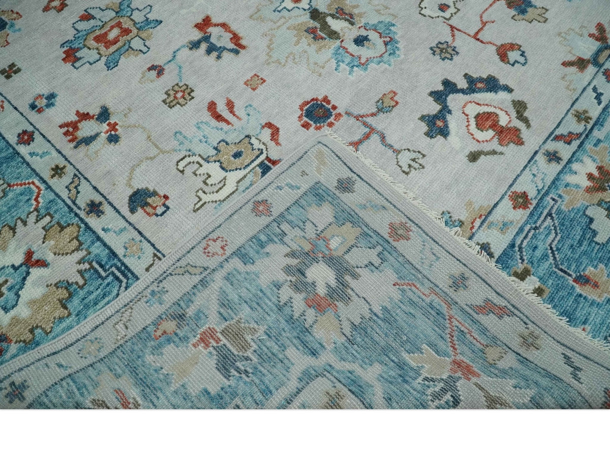 Ivory and Blue Hand knotted Traditional Oushak wool Area Rug.