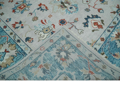 Ivory and Blue Hand knotted Traditional Oushak wool Area Rug.