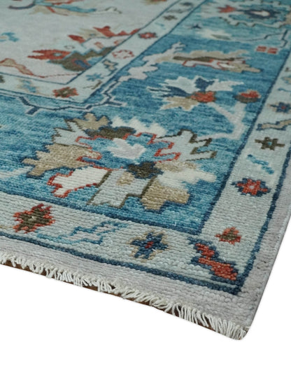Ivory and Blue Hand knotted Traditional Oushak wool Area Rug.