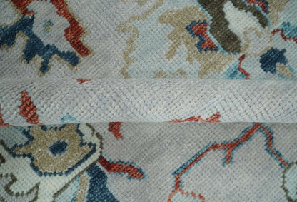Ivory and Blue Hand knotted Traditional Oushak wool Area Rug.