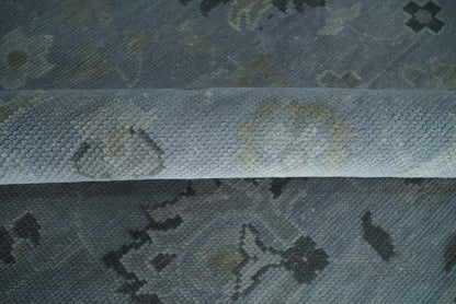 Antique style Blue, Silver and Charcoal Hand Knotted Oushak Wool Area Rug.
