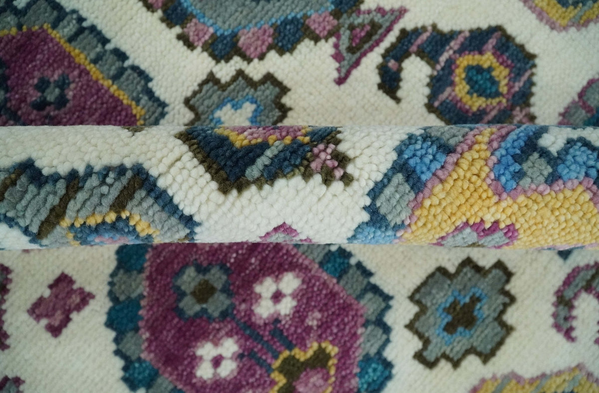 Ivory, Gold and Pink Hand knotted Traditional Design Wool Area Rug.