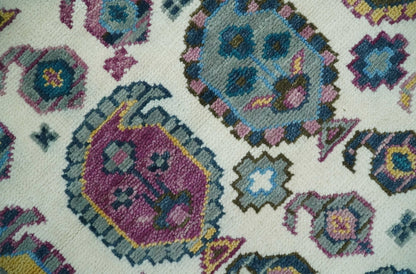Ivory, Gold and Pink Hand knotted Traditional Design Wool Area Rug.