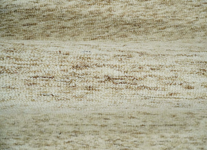 Beige and Ivory Modern Solid Hand Woven Wool Rug.