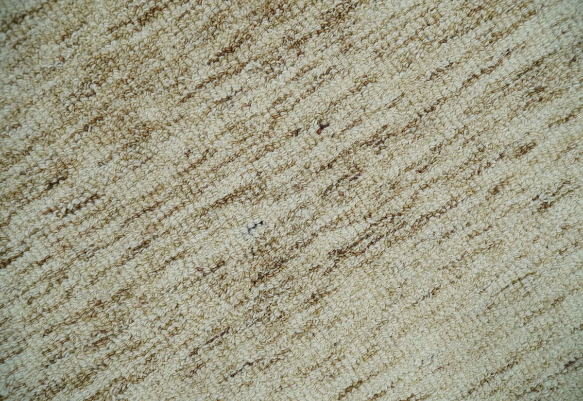 Beige and Ivory Modern Solid Hand Woven Wool Rug.
