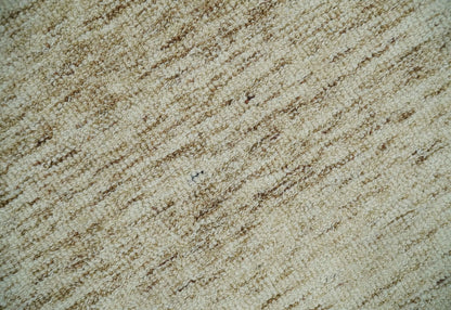 Beige and Ivory Modern Solid Hand Woven Wool Rug.