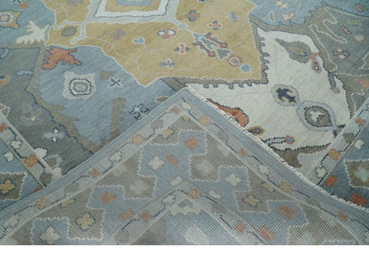 Beige, Blue and Ivory Hand Knotted Traditional Wool Area Rug.