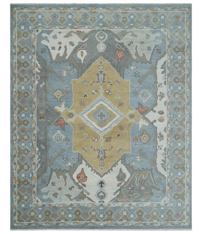 Beige, Blue and Ivory Hand Knotted Traditional Wool Area Rug.