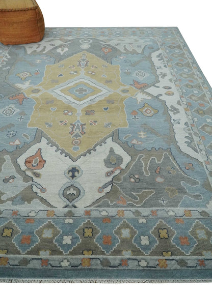 Beige, Blue and Ivory Hand Knotted Traditional Wool Area Rug.