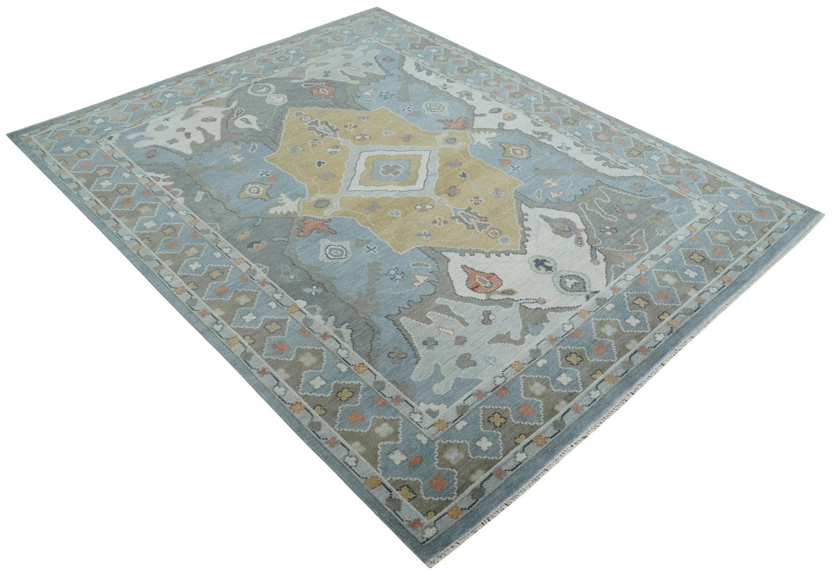 Beige, Blue and Ivory Hand Knotted Traditional Wool Area Rug.