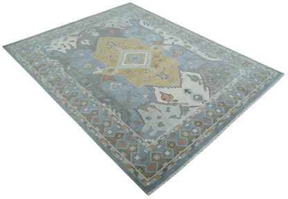 Beige, Blue and Ivory Hand Knotted Traditional Wool Area Rug.