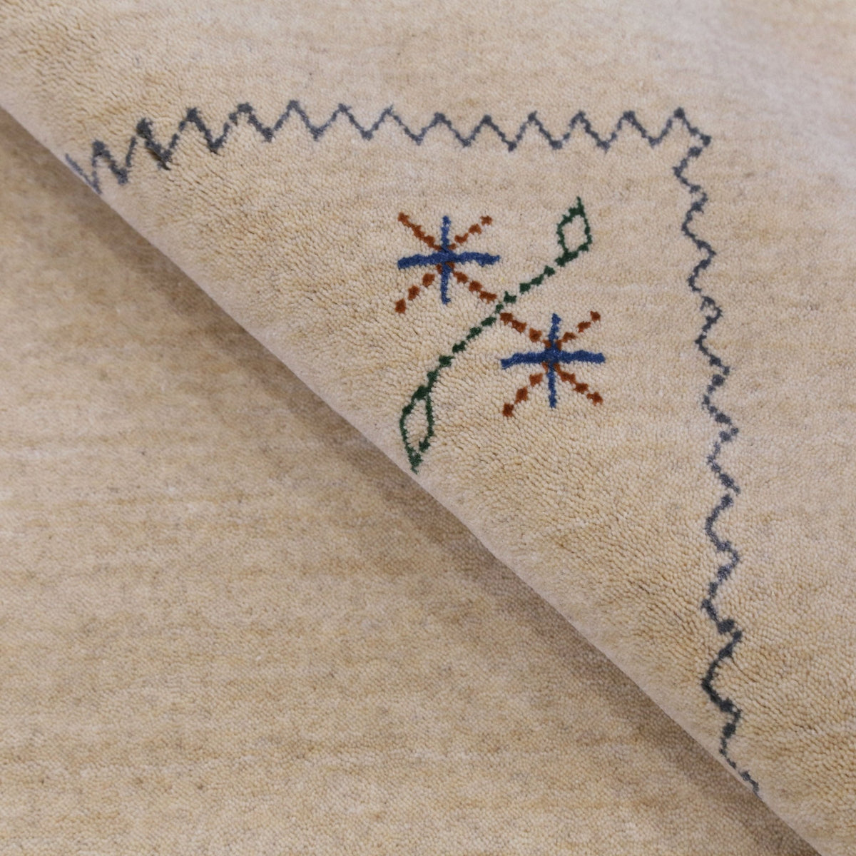 Beige Border Design Hand Loomed Wool Area Rug.