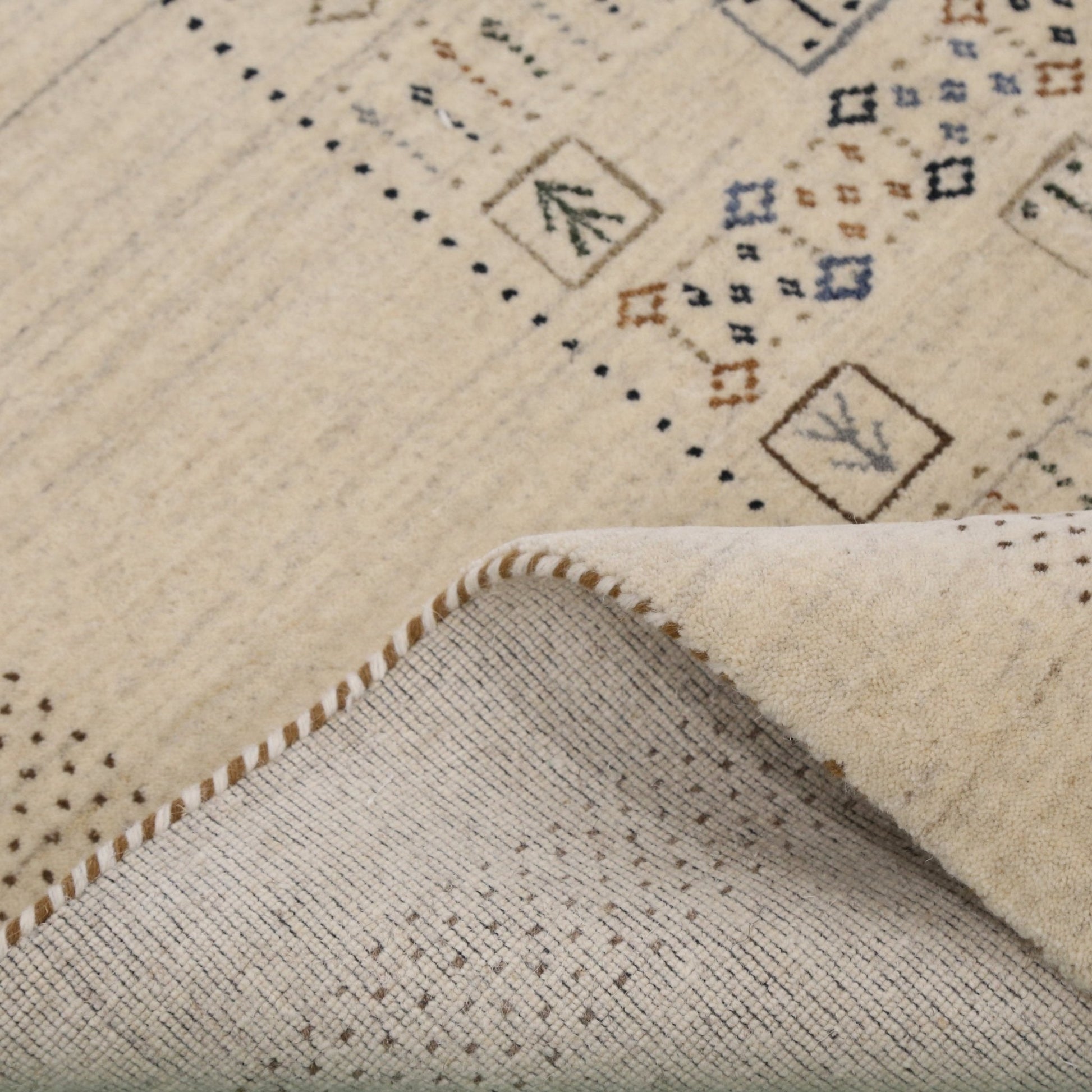 Beige Center Pattern Design Hand Loomed Wool Area Rug.