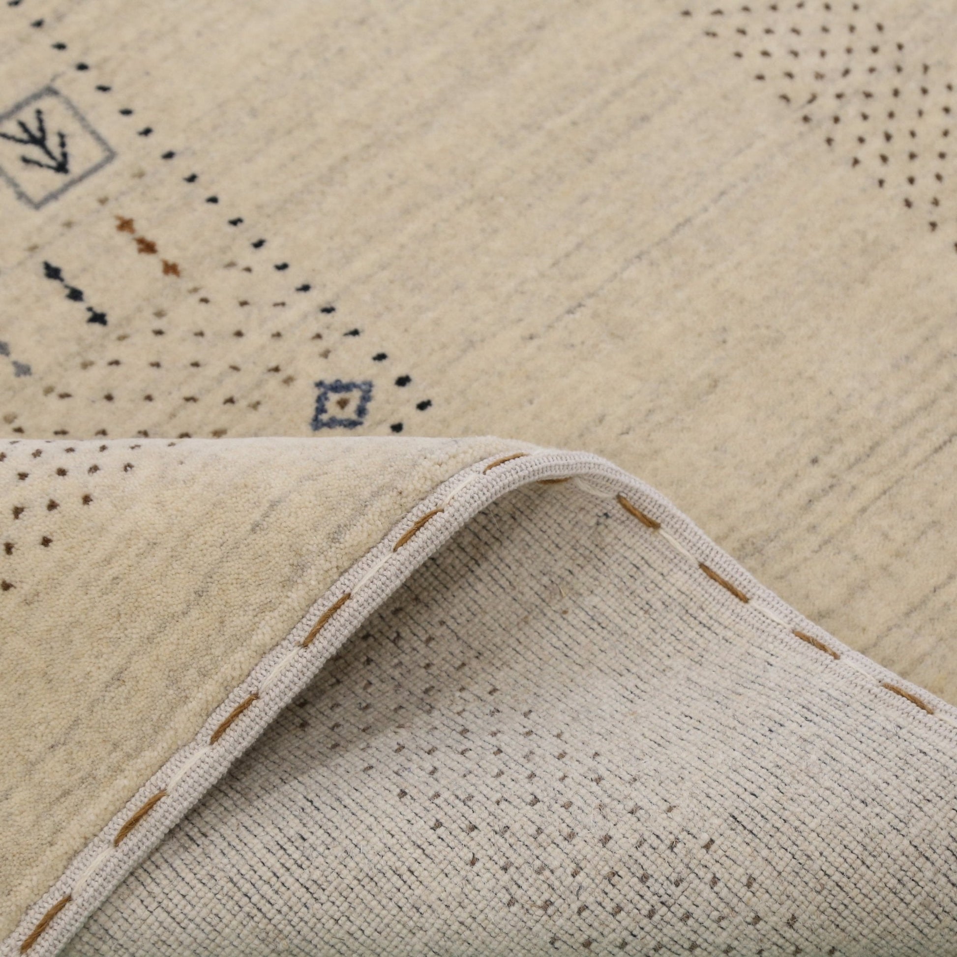 Beige Center Pattern Design Hand Loomed Wool Area Rug.