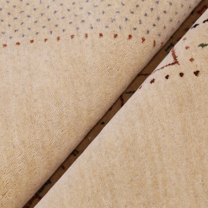 Beige Center Pattern Hand Loomed Wool Area Rug.