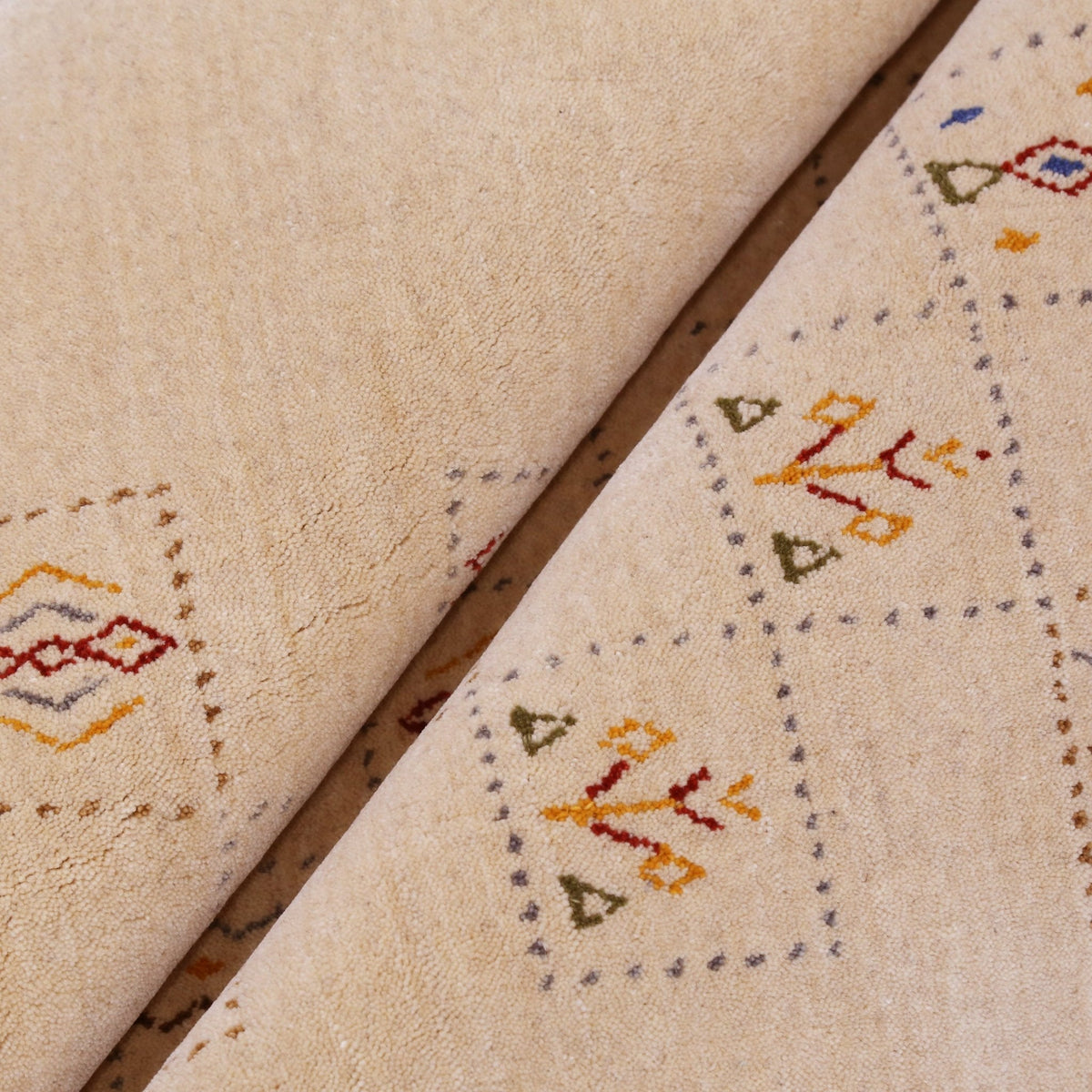 Beige Contemporary Tribal Design Hand Loomed Wool Rug.