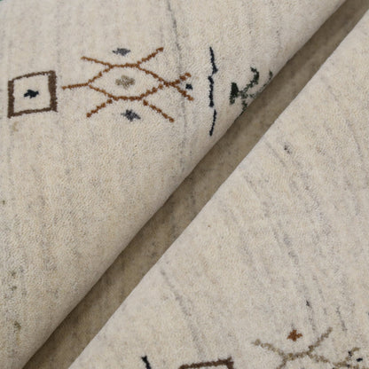 Beige Tribal Border Hand Loomed Wool Area Rug.