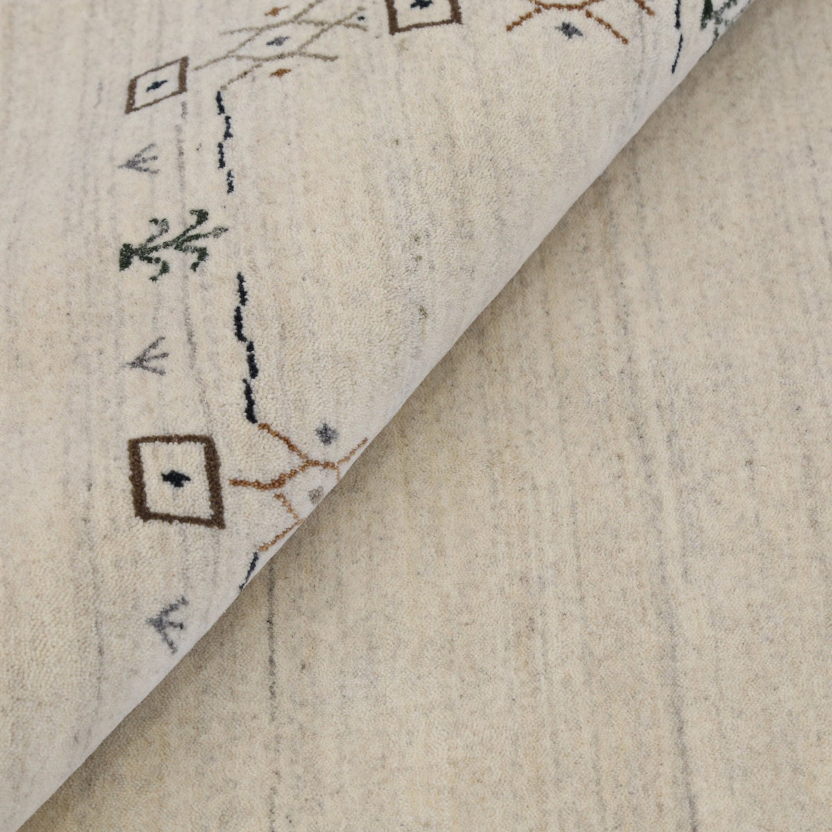 Beige Tribal Border Hand Loomed Wool Area Rug.