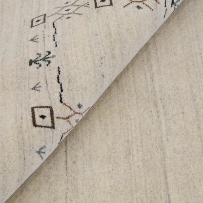 Beige Tribal Border Hand Loomed Wool Area Rug.