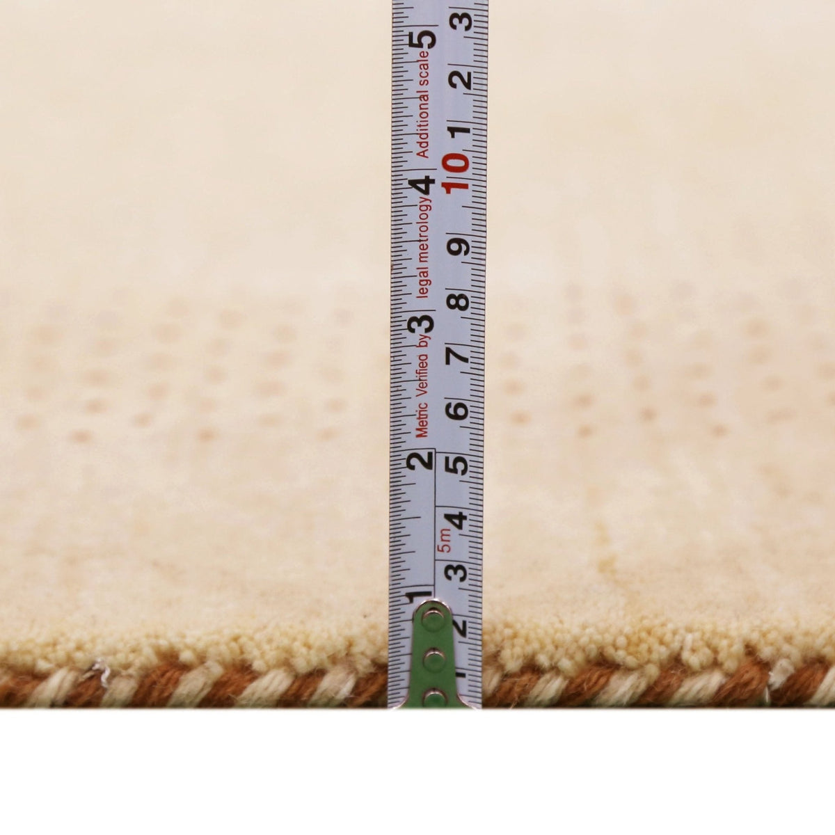 Beige Tribal Center Medallion Hand Loomed Wool Area Rug.