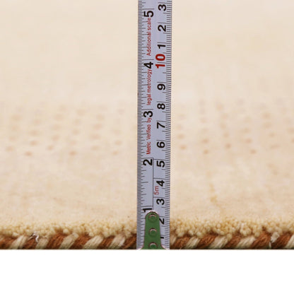 Beige Tribal Center Medallion Hand Loomed Wool Area Rug.