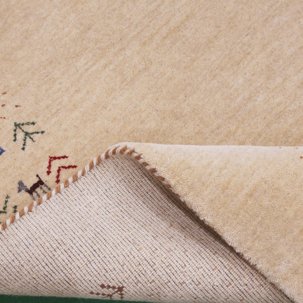 Beige Tribal Center Medallion Hand Loomed Wool Area Rug.