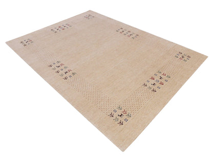 Beige Tribal Center Medallion Hand Loomed Wool Area Rug.