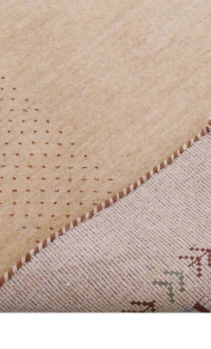 Beige Tribal Center Medallion Hand Loomed Wool Area Rug.