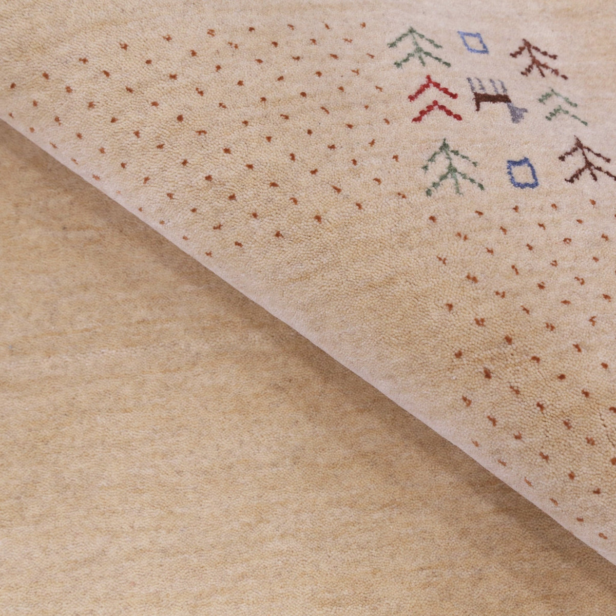 Beige Tribal Center Medallion Hand Loomed Wool Area Rug.