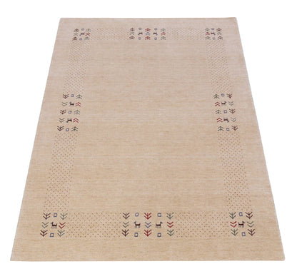 Beige Tribal Center Medallion Hand Loomed Wool Area Rug.