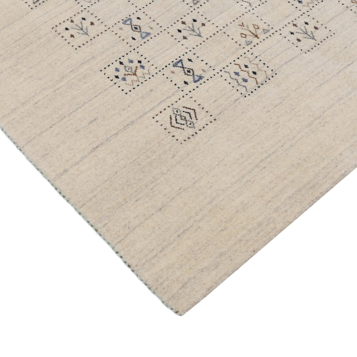 Beige Tribal Design Hand Loomed Wool Area Rug.