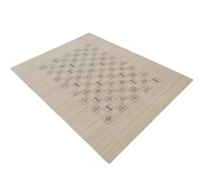 Beige Tribal Design Hand Loomed Wool Area Rug.
