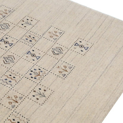 Beige Tribal Design Hand Loomed Wool Area Rug.