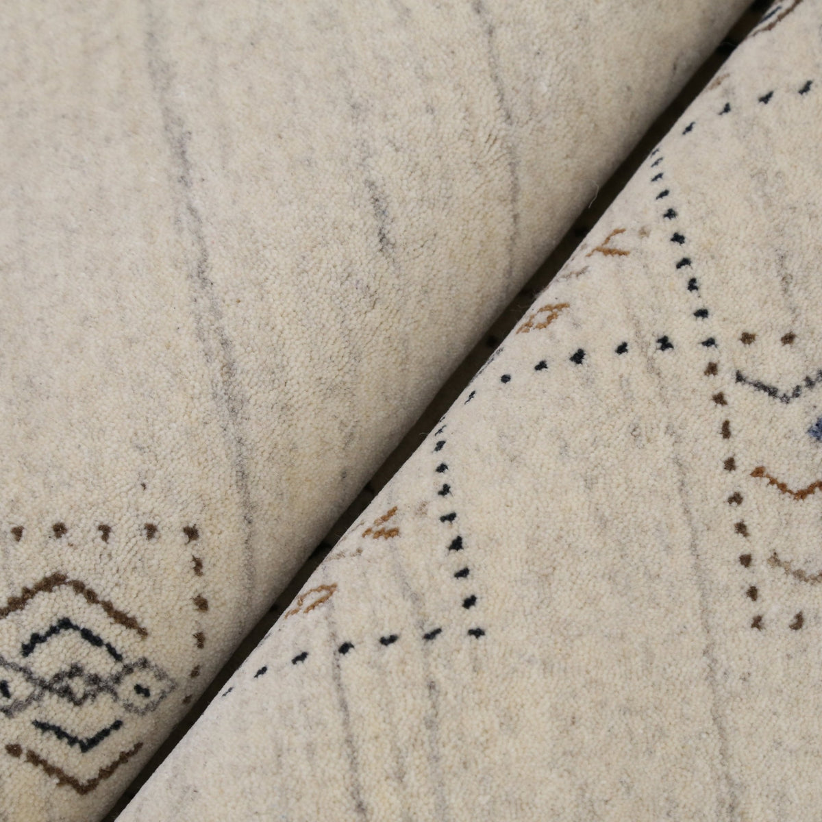 Beige Tribal Design Hand Loomed Wool Area Rug.